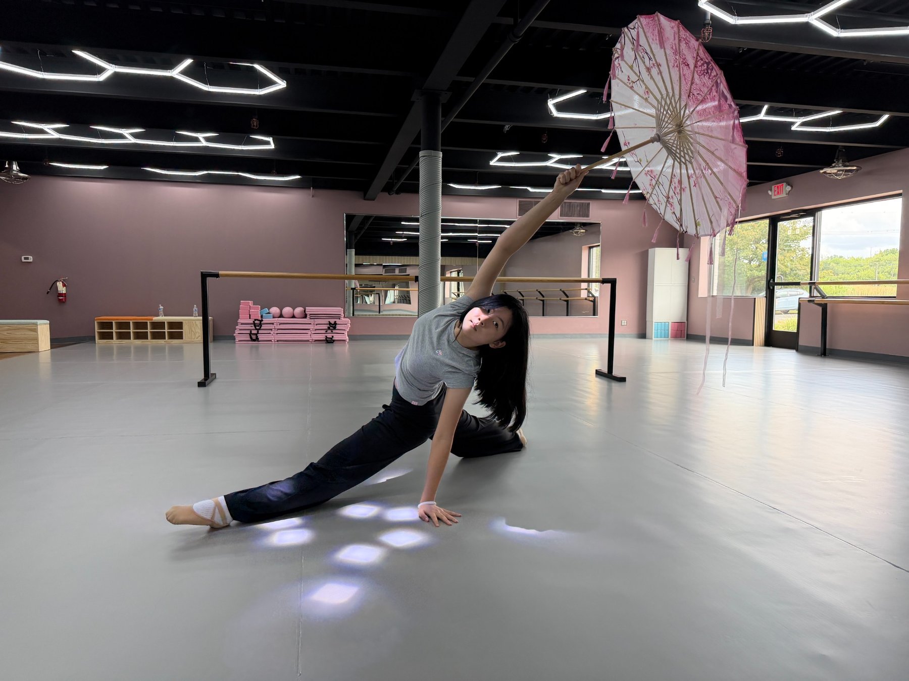 H&L Dance children practicing coordinated body technique in the new studio