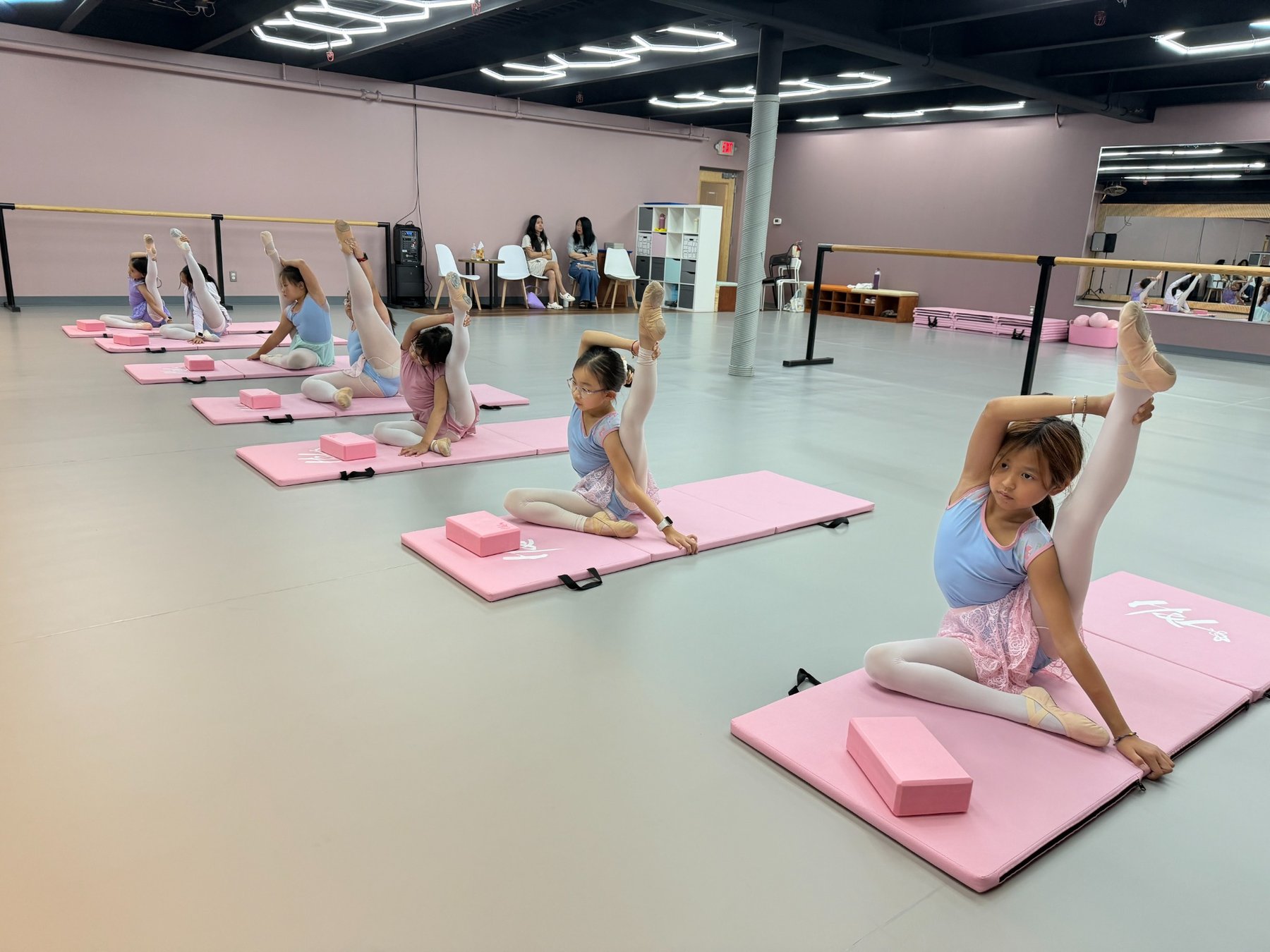 H&L Dance children practicing flexibility and technique in the Ann Arbor studio