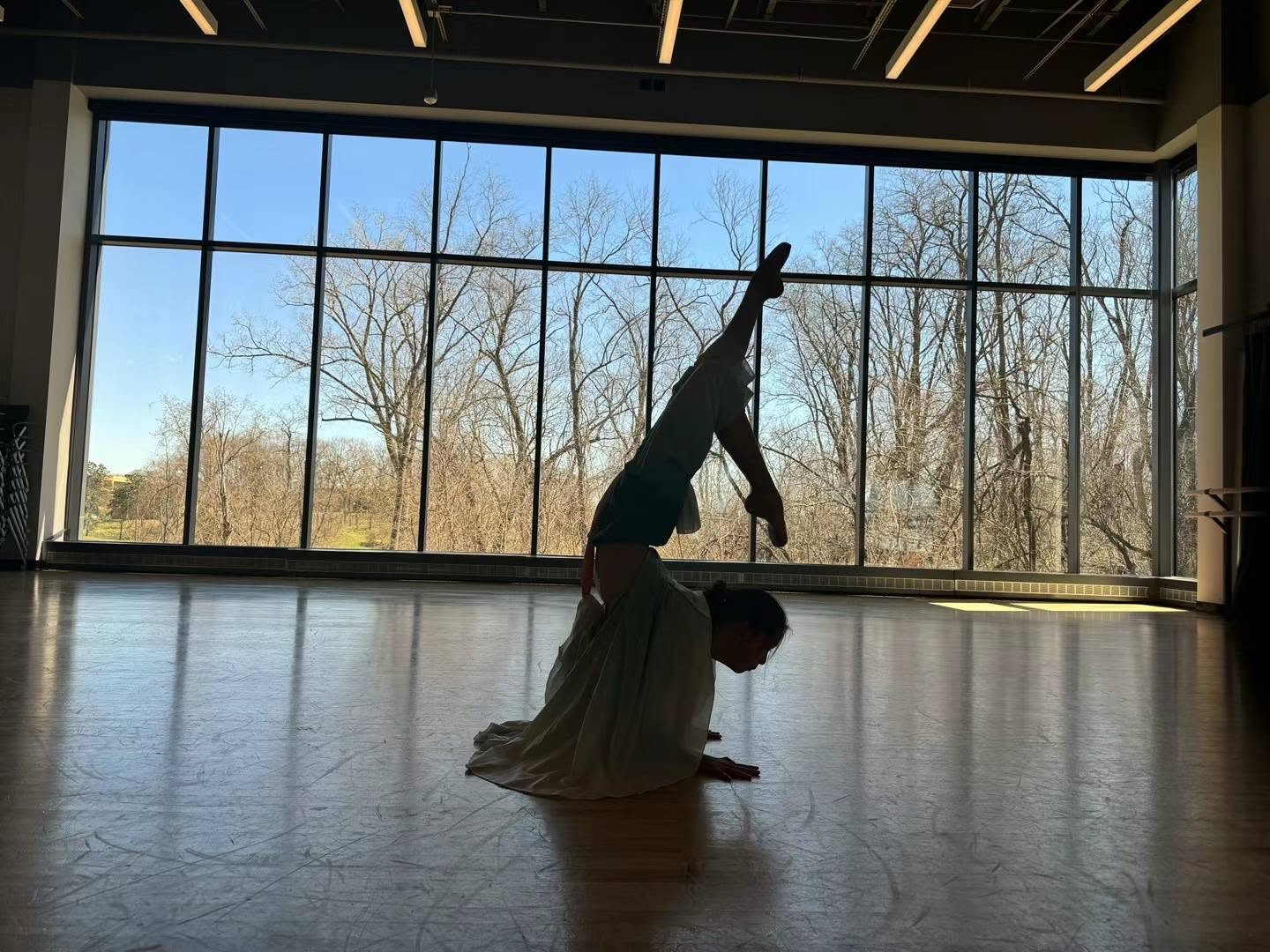 H&L dancer training in a sunlit studio