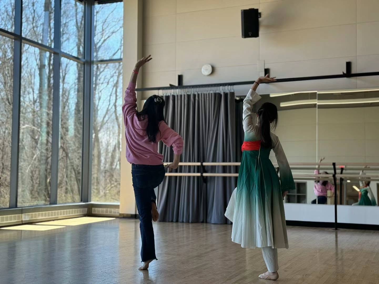 Teacher coaching an H&L dancer